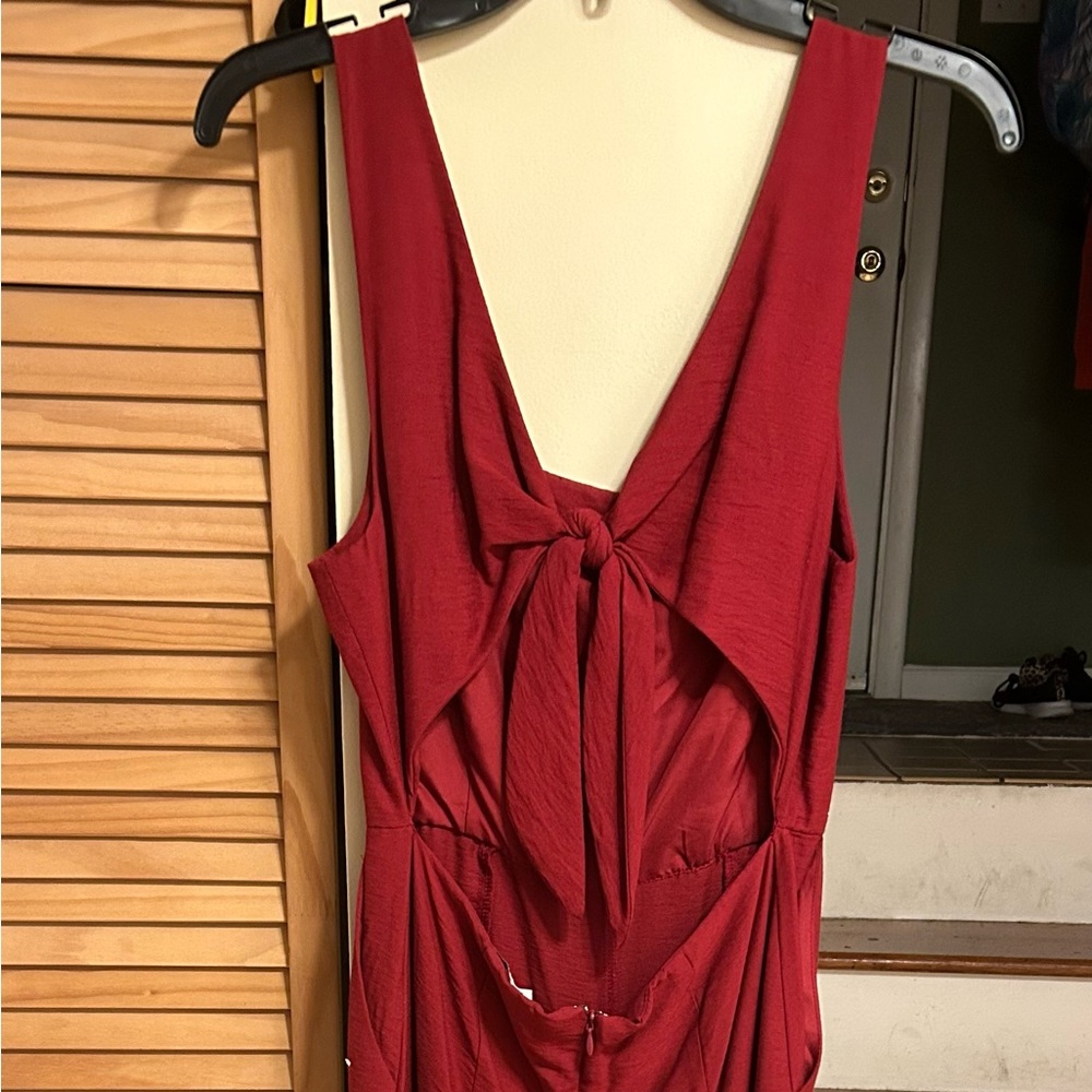 Forever 21 Red jumpsuit size M Bow Back Perfect For Christmas